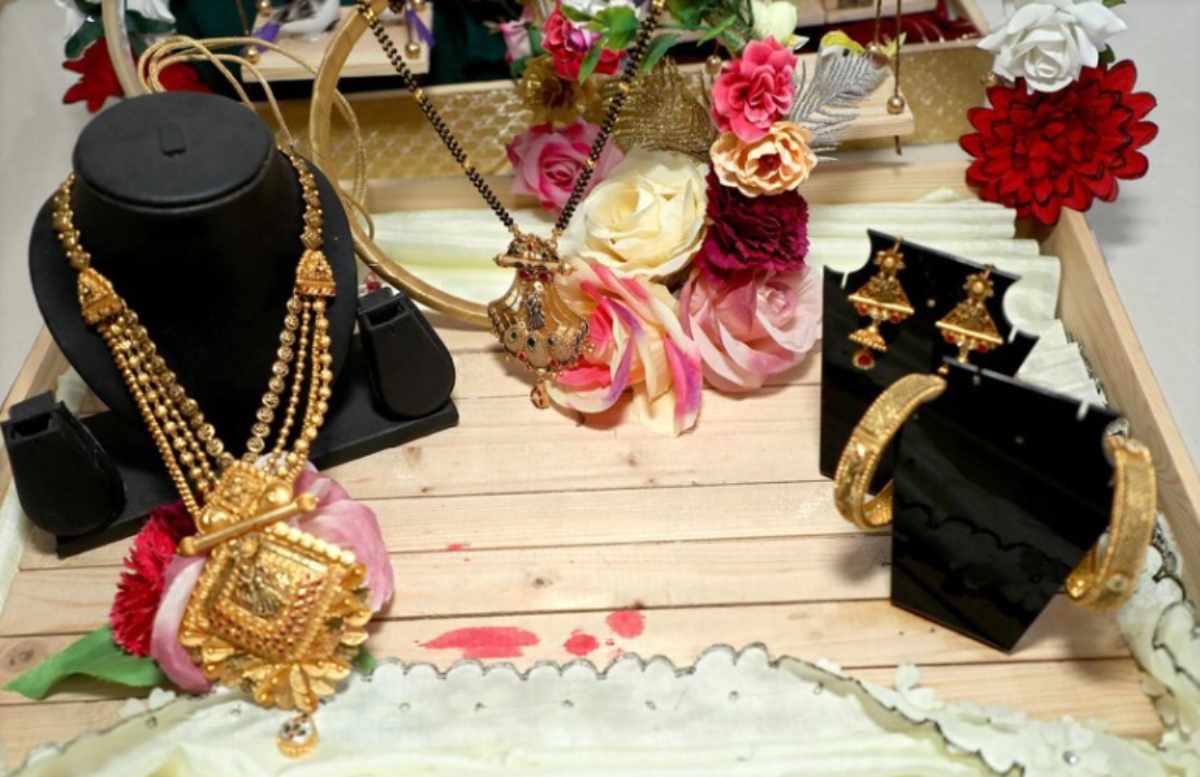 Various types of jewelry including rings, necklaces, earrings, bracelets, and anklets displayed on a stylish background, showcasing fashion essentials for every lover of accessories