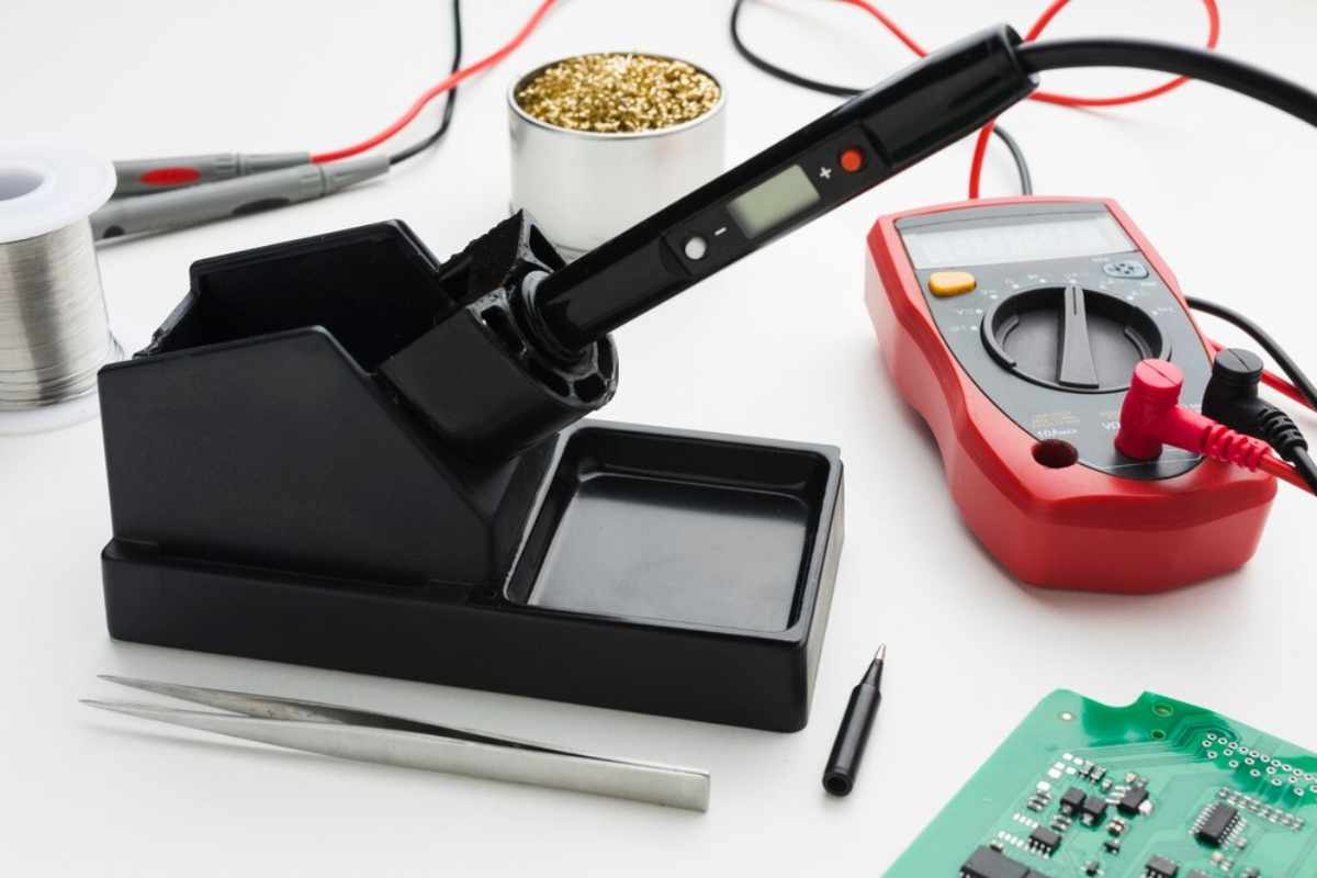External power supply connected to Kato accessories on a model train layout, ensuring stable and reliable performance for lighting, switches, and other components.