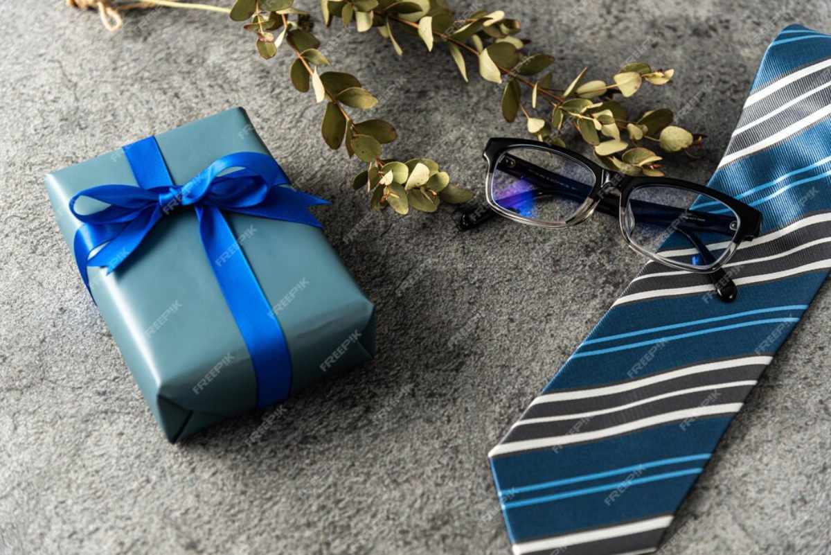 Close-up of a Box Tie with a neat, structured knot, worn with a formal suit for a polished and sophisticated appearance.