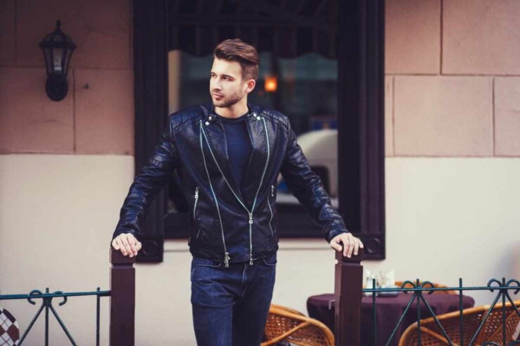 Man in tailored suit walking confidently down the street